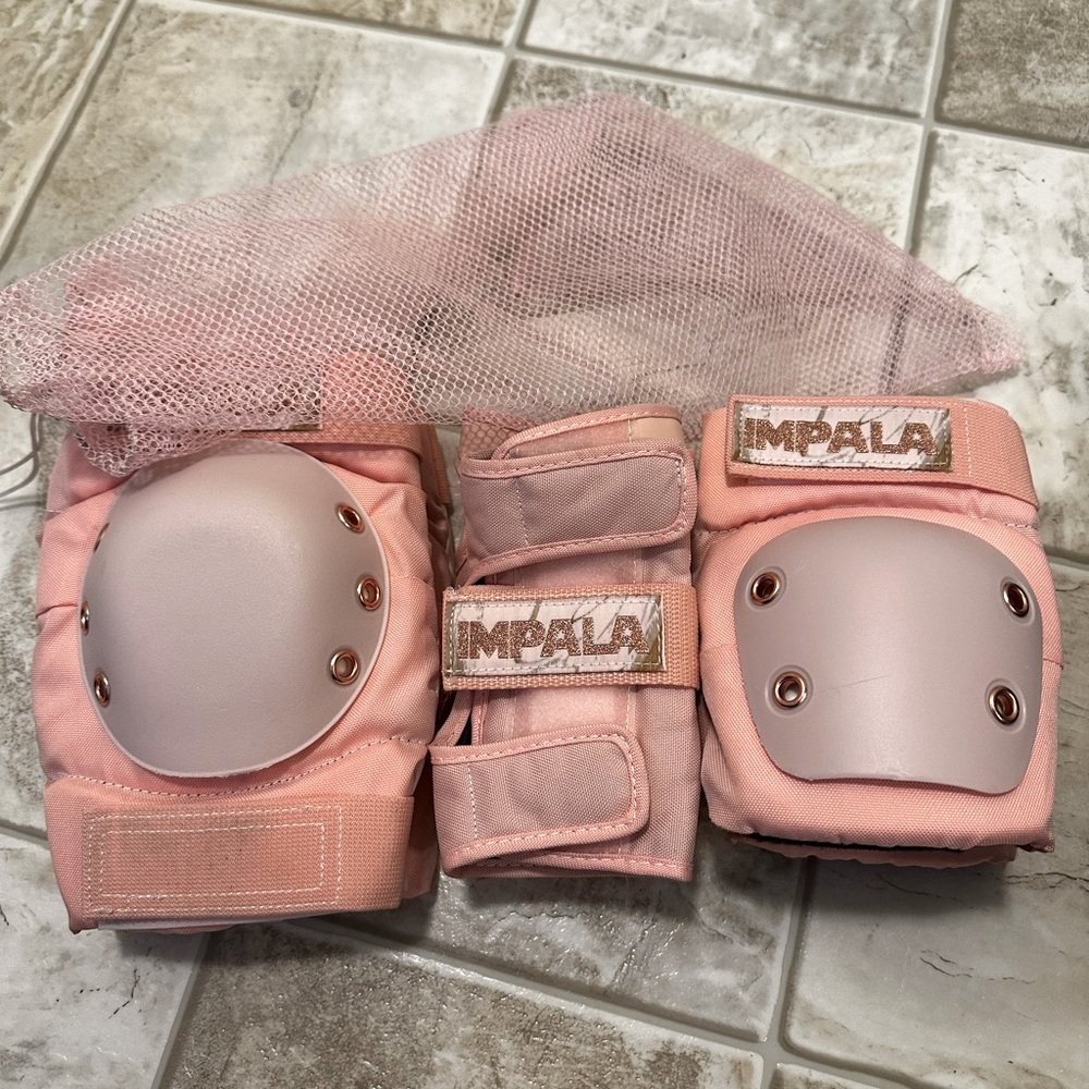 Impala pads in Marawa Rose Gold colors, includes elbow, wrist, and knee pads.
